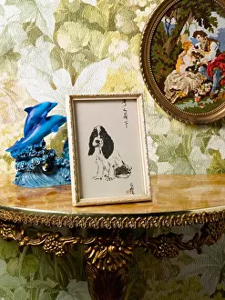 Grandma Prints: A hall table dressed with tacky ornaments