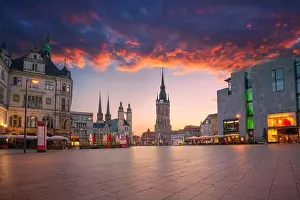Halle, Germany. Cityscape image of historical downtown of Halle (Saale) with the Red Tower and the Market Place during dramatic sunset