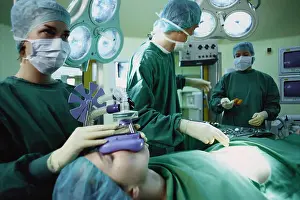 Environments Prints: Hamburg, Germany, physicians with patient during anesthesia