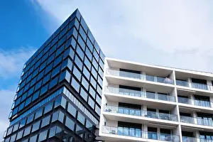 Urban Living Prints: Hamburg, Germany - Sept 2022: Garbe Campus tower with blue box windows facade in Hafencity