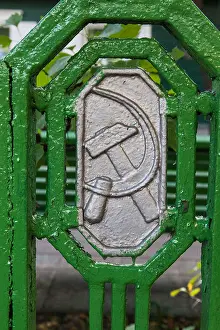 Minsk Prints: A hammer and sickle insignia of the Communist Party used as part of some cast iron railings