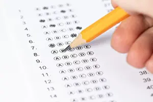 College Education Prints: hand fill in Exam papers sheet and pencil. Take the exam, write the exam