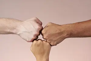 Latina Prints: Hand fist bumping isolated. 3 people bumping their fist. Teamwork and success concept