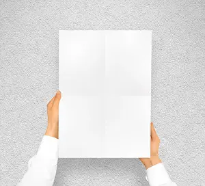 Brochure Prints: Hand holding poster mock up. Nice mockup to show your design