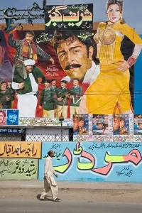 Punjab Prints: Hand painted billboards advertising movies outside a cinema (possibly the Prince cinema?) in Lahore