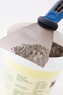 Handcraft Prints: Handcraft cement and putty knife on white background