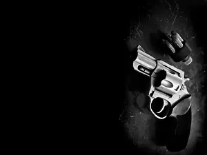 Deadly Prints: Handgun revolver personal weapon for defense on wooden background Second Amendment firearm gun