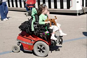 Disability Prints: Handicapped children attend and enjoy the Florida State Fair in Tampa Florida FL