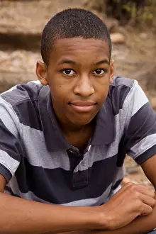 Good Looking Prints: Handsome African-American Male sitting in outdoor setting