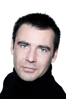 Casual Wear Prints: handsome caucasian man smiling short brown with polo turtle neck hair blue eyes portrait expressing portrait on studio