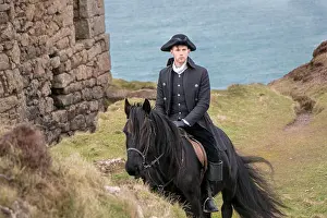 Horse Rider Prints: Handsome Male Horse Rider Regency 18th Century Poldark Costume with tin mine ruins and Atlantic ocean in background