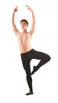 Practicing Prints: Handsome young ballet dancer on white background