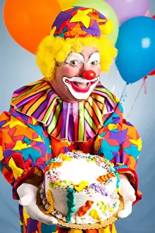 Entertainer Prints: Happy birthday clown holding a birthday cake. Cake is ready for your text