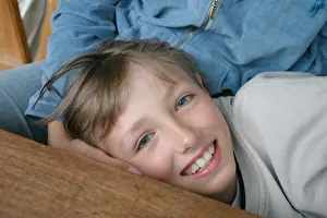 Lean Prints: Happy boy on the lap of his mother