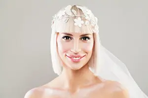 Veil Prints: Happy Bride Woman. Beautiful Blonde Fashion Model with Bob Hairstyle, Makeup and Veil