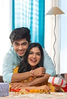 Gifts Prints: A HAPPY BROTHER AND SISTER POSING IN FRONT OF CAMERA ON RAKSHABANDHAN