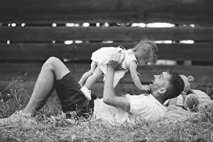 Throw Prints: Happy family on lawn in the park