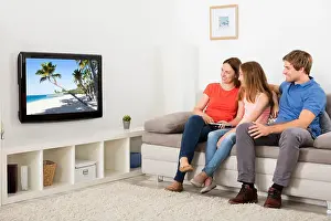 Homey Prints: Happy Family Watching Television At Home