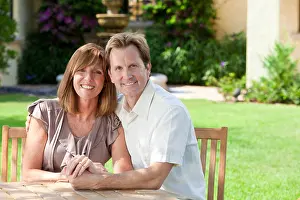 Dental Prints: Happy middle aged man and woman married couple in their thirties