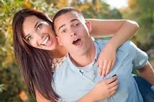 Young Girl Prints: Happy Mixed Race Romantic Couple Piggyback Portrait in the Park
