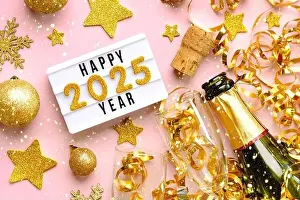 Snowflakes Prints: Happy new year 2025.Top view of lightbox with the word Happy year 2025