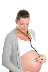 Expressing Positivity Prints: Happy, pregnant woman with stethoscope on belly