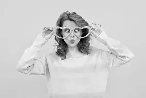 Redhead Prints: happy redhead woman wear funny party glasses on yellow background, party time
