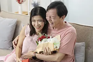 Affectionate Prints: A happy senior couple enjoying Valentine's Day