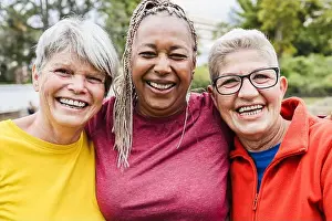 Feminism Prints: Happy senior women having fun together - Multiracial friends laughing on camera after yoga sport workout outdoor - Main