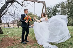 Veil Prints: Happy stylish smiling couple walking in Tuscany