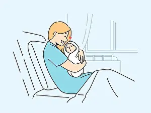 Cuddling Prints: Happy woman sit in hospital bed cuddling newborn baby