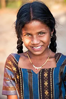 Villagers Prints: Happy young rural Indian village girl in afternoon sunlight. Andhra Pradesh, India