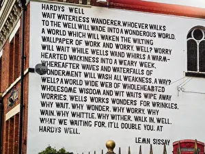 Mural Prints: Hardy's Well, a 1994 poem by the poet Lemn Sissay on the side of the Hardy's Well pub in Manchester