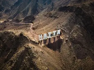 Hatta city welcoming sign written with large letters placed in Hajar mountains in Hatta enclave of Dubai in the United