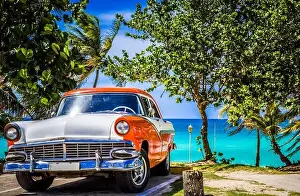 Dreamlike Prints: HDR - Parked american white orange Ford Fairlane vintage car in the front view on the beach in Varadero Cuba - Serie