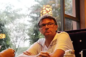 Guangdong Prints: Head coach Philippe Troussier of Chinas Shenzhen Ruby Football Club looks on during an interview at a hotel in Shenzhen