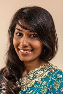 Indian Woman Prints: Headshot portrait of a beautiful Indian woman smiling
