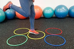 Gymnastics Prints: Health club. Training with plastic hoops. France