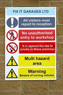 Informative Prints: A Health and Safety sign outside a garage workshop