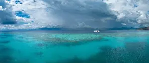 A healthy coral reef thrives off the Pulau Besar north of Flores, Indonesia. This exotic, tropical region is known for its high marine biodiversity
