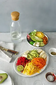 Noodles Prints: Healthy food clean eating. Spiralized vegetables with bowl of buddha on white wooden table