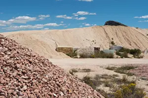 Shovel Prints: heaps of gravel and sand in surface quarry