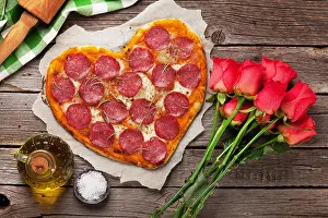 Valentines Prints: Heart shaped pizza with pepperoni and mozzarella and red rose flowers bouquet