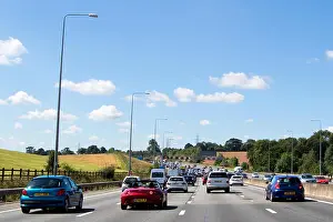 Heavy Prints: Heavy traffic on the M25 motorway anticlockwise looking south between junctions 15 and 16
