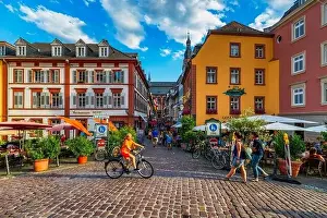 River Neckar Prints: Heidelber, Germany - July 6, 2019: Marketplace crowded with tourists and Town Hall in Heidelberg in Germany