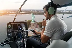 Helicopter cockpit with pilot arm and control console inside the cabin on Liberty Island