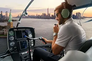 Helicopter cockpit with pilot arm and control console inside the cabin on Liberty Island