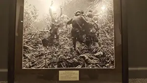 Kentucky Prints: Help From Above is a 1966 Vietnam War photograph by Art Greenspon depicting soldiers of Company A