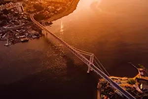 Santa Catarina Prints: Hercilio luz cable bridge with sunset light in Florianopolis, Brazil. Aerial view