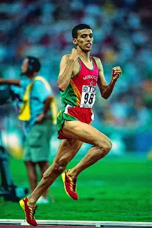 Athlete Prints: Hicham El Guerrouj (MAR) wins the 1500m at the 1999 World Championships in Athletics